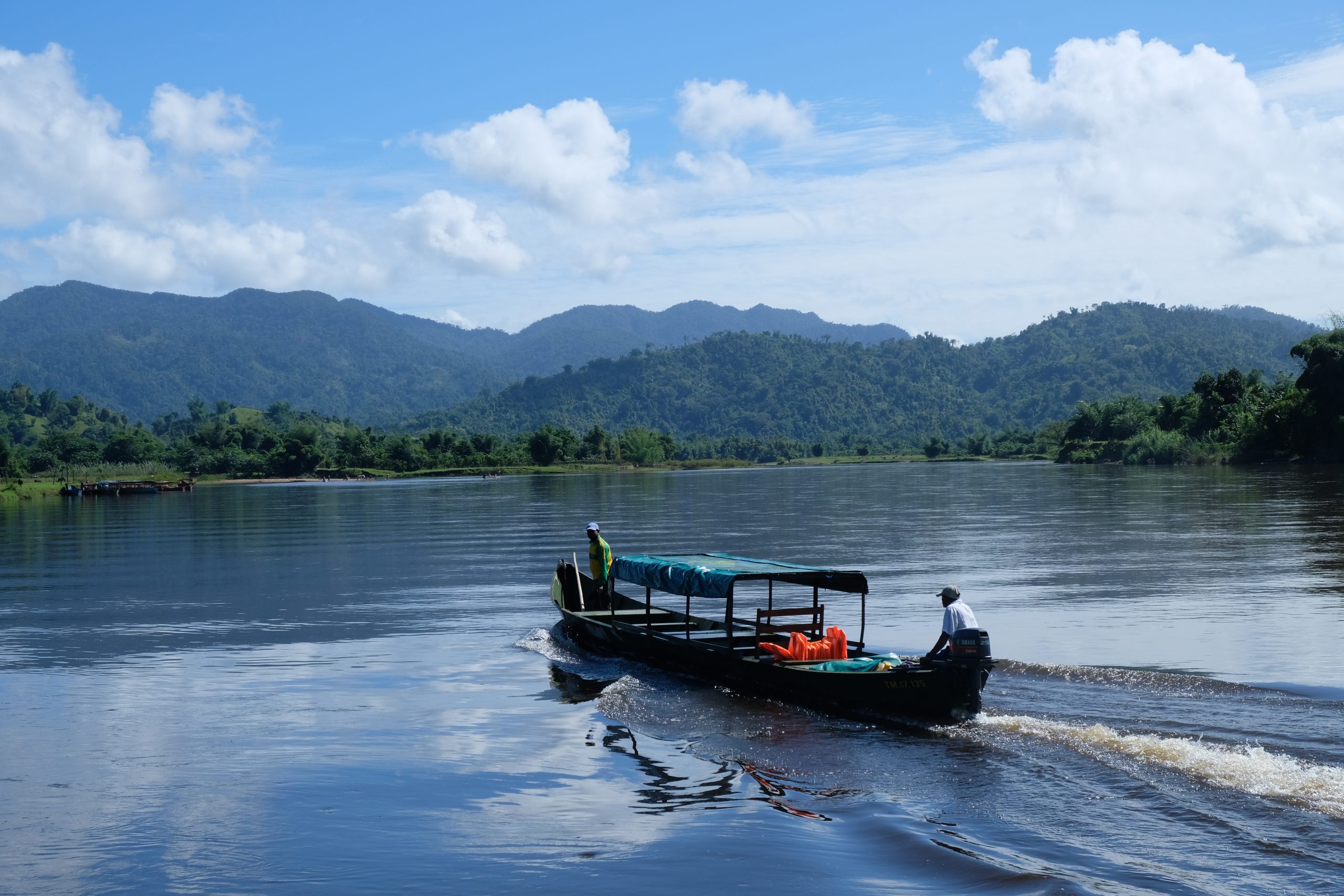 Boat on river in forest